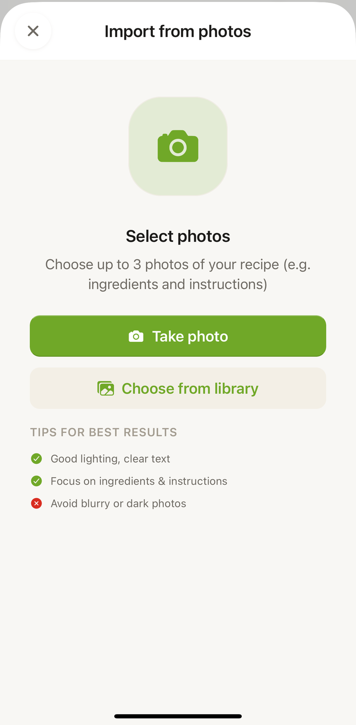 The photo import screen on iPhone showing 'Take Photo' and 'Choose from Library' options